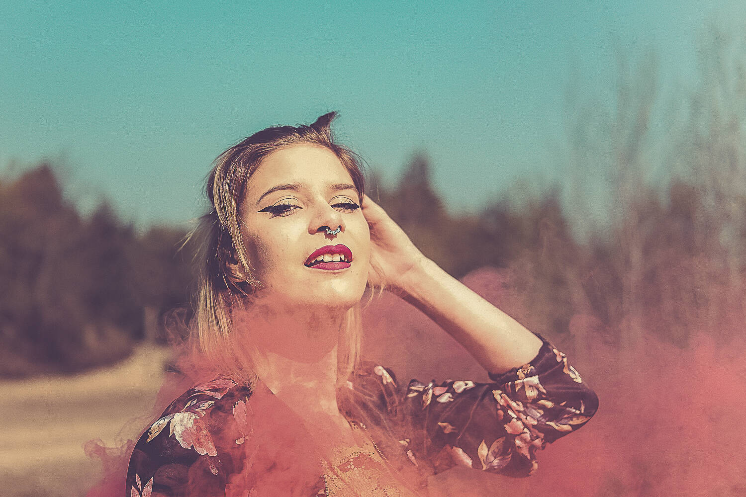 blonde woman with smoke