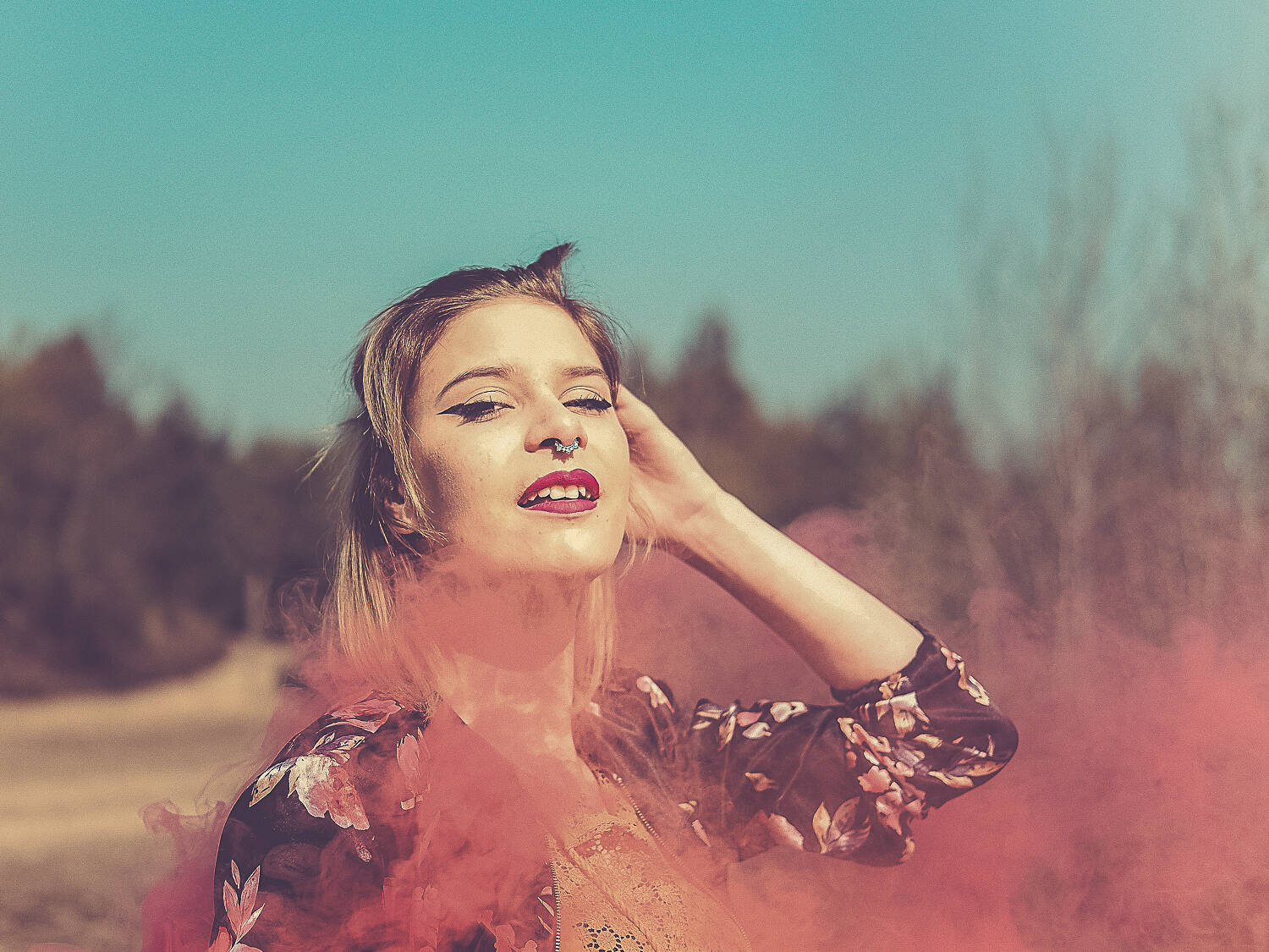 blonde woman with smoke