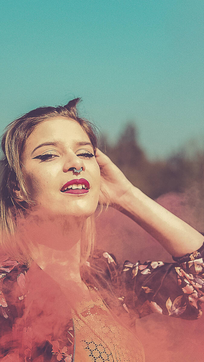 blonde woman with smoke