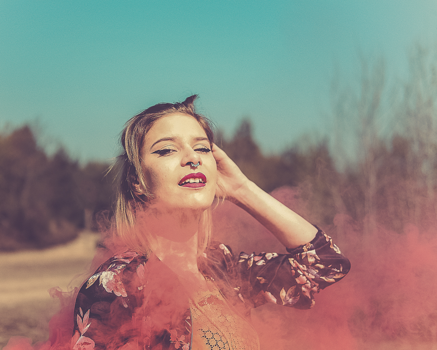 blonde woman with smoke