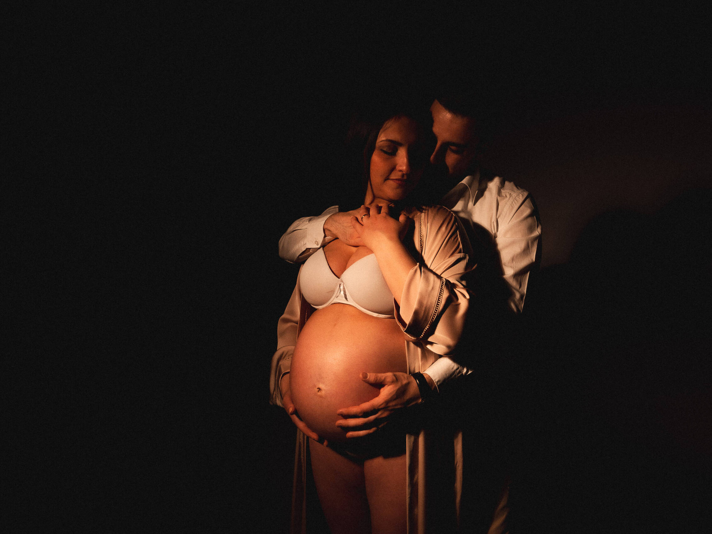 Couple with pregnant woman